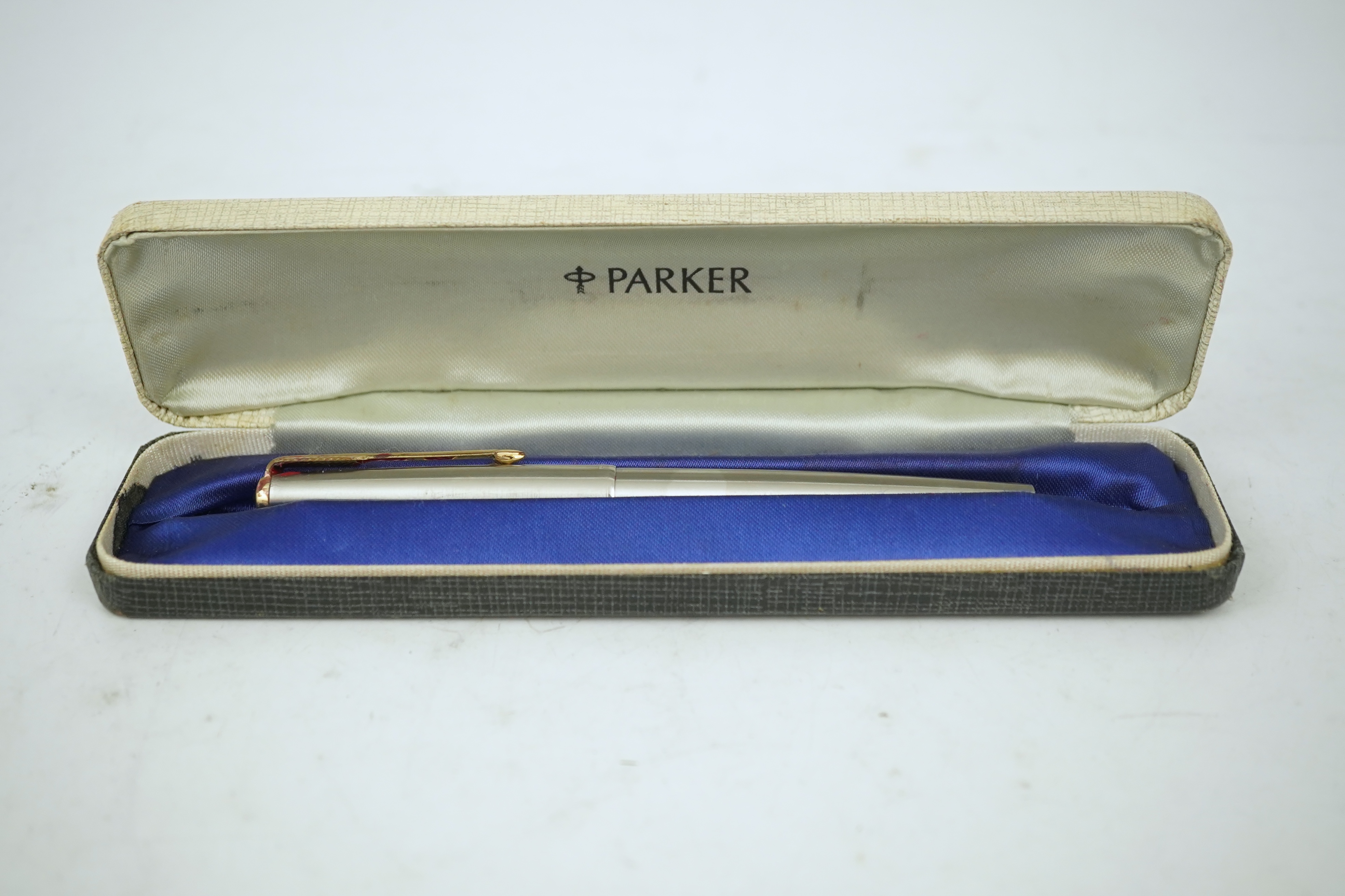 A Cross advertising propelling pencil, Cointreau on ice, a Parker felt tip cartridge pen and a cased Parker stainless steel pen. Condition - poor to fair